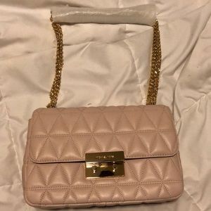 Michael Kors hand bag, brand new with tags